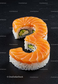 Fresh salmon sushi roll with avocado and cream cheese