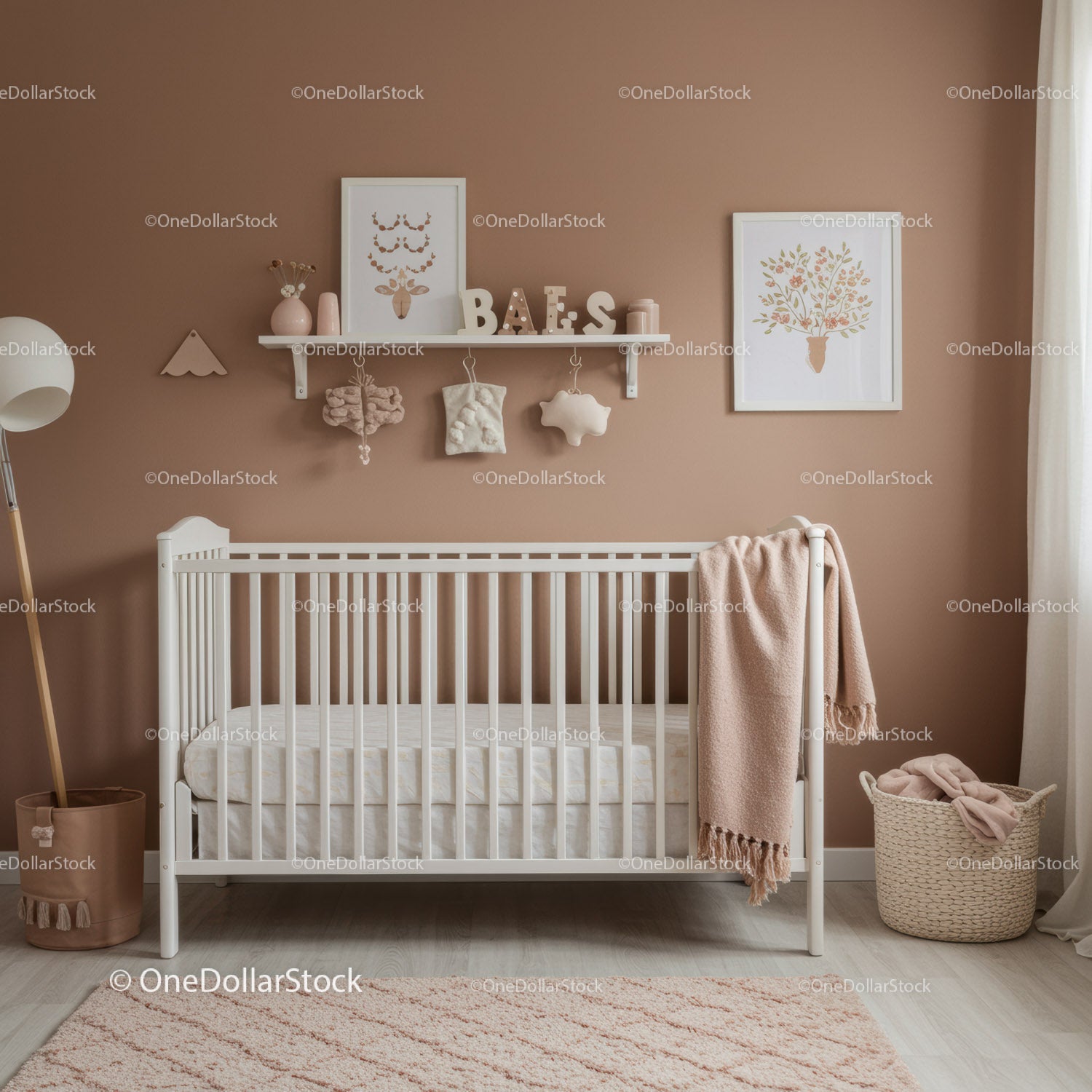 Stylish Nursery with White Baby Crib and Soft Pink Wall Decor