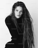 Female Portrait with Long Hair and Intense Gaze in Black and White