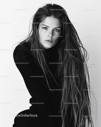 Female Portrait with Long Hair and Intense Gaze in Black and White