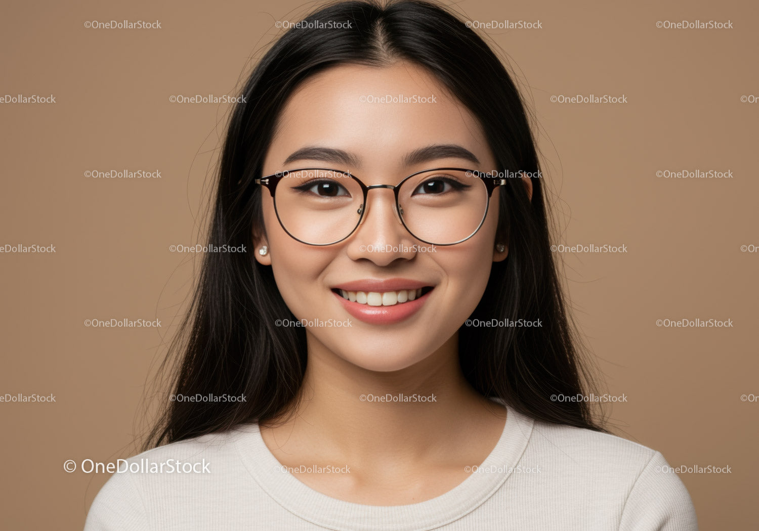 Portrait of a Young Woman with Glasses Smiling in Studio