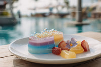 Colorful Layered Jelly Desserts with Fruits and Edible Flowers