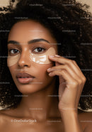 Elegant Black Woman Applying Under Eye Patches for Skin Care