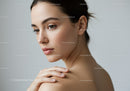 Close-Up Portrait of a Woman with Elegant Facial Features and Clear Skin