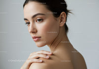 Close-Up Portrait of a Woman with Elegant Facial Features and Clear Skin