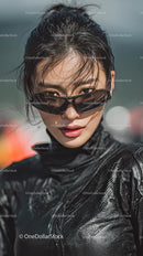 Confident Young Woman in Stylish Black Outfit and Sunglasses