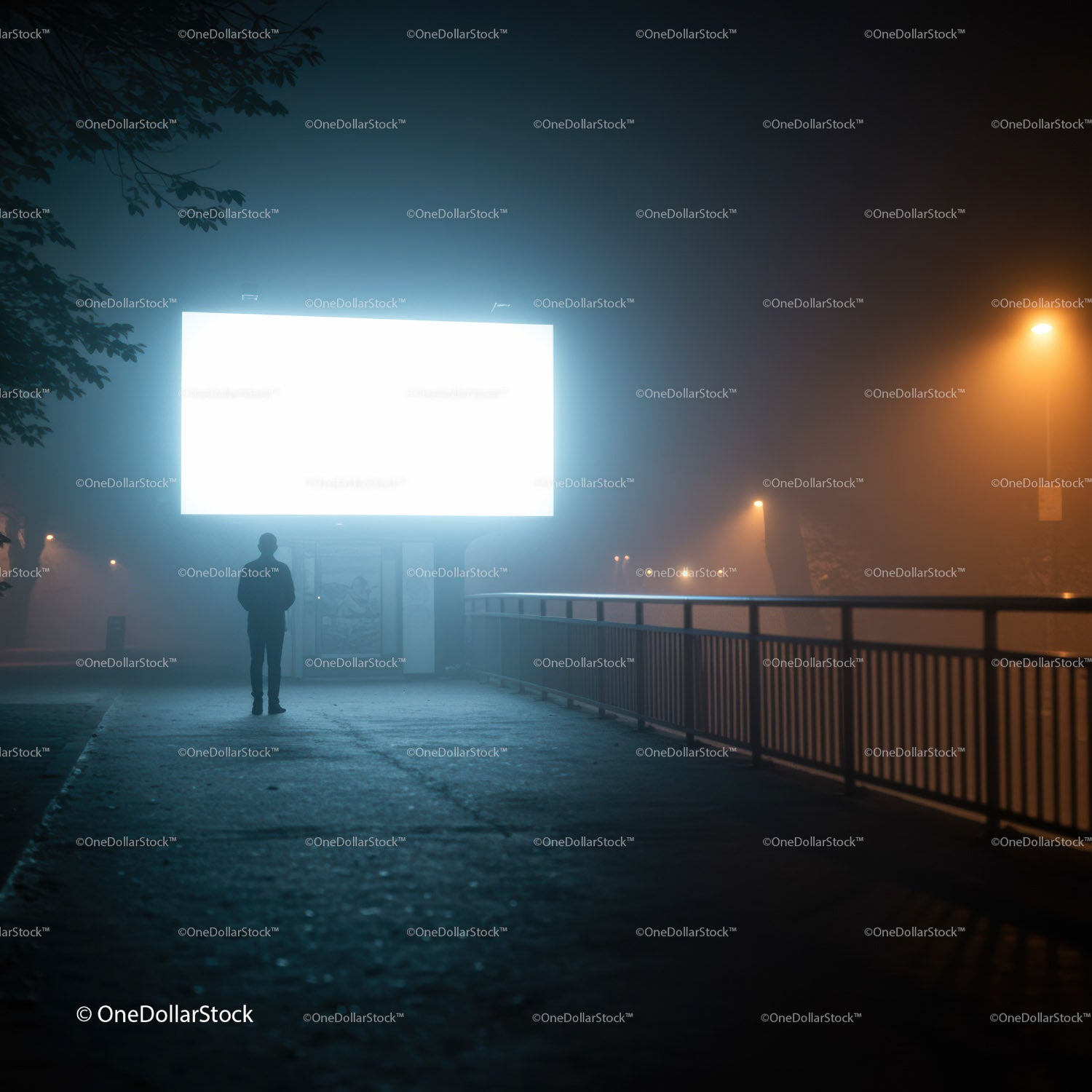 Silhouette of person near glowing billboard on foggy night