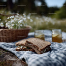Fresh Peanut Butter and Jelly Sandwiches on Rustic Picnic Setting