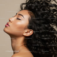 Profile of Relaxed Woman with Flowing Curly Hair