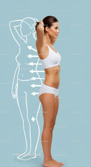 Fitness Model Stretching During Workout in Modern Studio