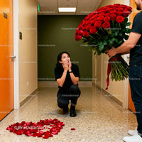 Woman Surprised by Giant Bouquet of Roses Indoors