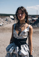 Edgy Metallic Dress with Layered Jewelry in Outdoor Summer Setting