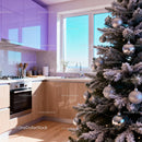 Festive Christmas tree in modern kitchen with natural light