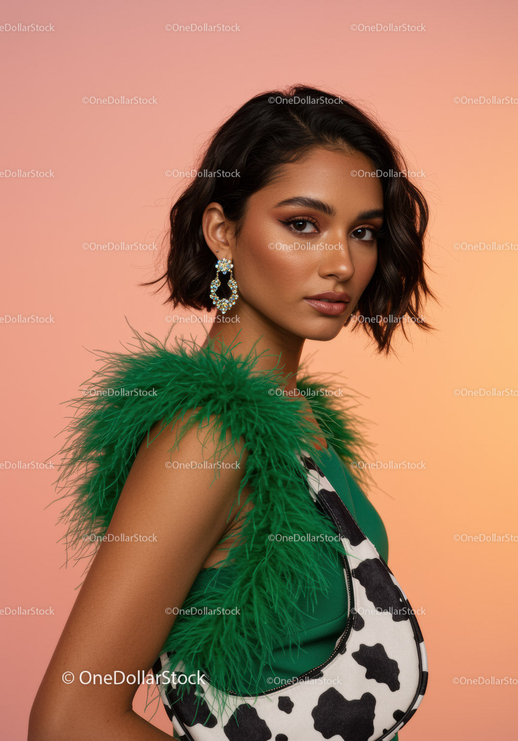 Chic Woman in Green Feathered Top and Cow Print Dress Studio Portrait
