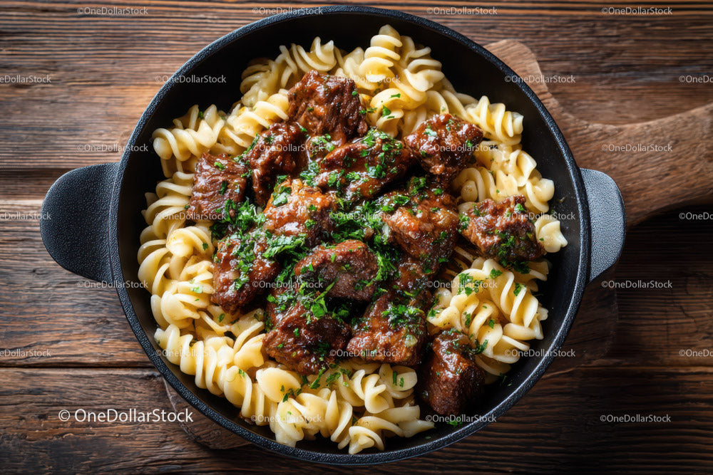 Hearty Beef and Cherry Tomato Pasta in Rustic Skillet