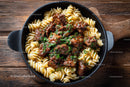 Hearty Beef and Cherry Tomato Pasta in Rustic Skillet