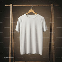 Minimalist White T-Shirt Hanging on Rustic Wooden Rack