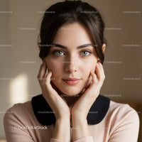 Elegant Young Woman with Piercing Eyes in Modern Fashion Portrait