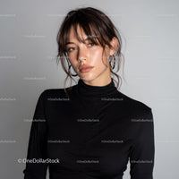 Stylish Woman in Black Turtleneck with Earrings Portrait