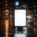 Nighttime Urban Bus Stop Shelter with Bright Advertising Panel