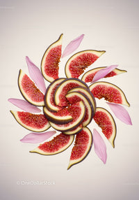 Creative arrangement of fresh fig slices with pink petals