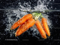 Fresh Orange Carrots in Water Splash for Healthy Food Presentation