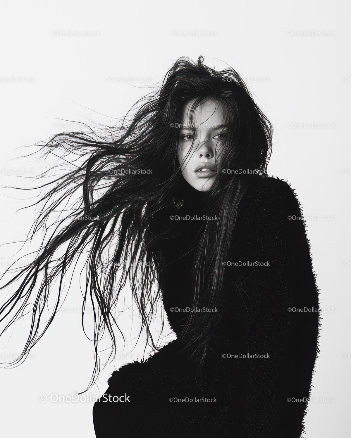 Black and White Portrait of Woman with Flowing Hair in Artistic Studio Setting