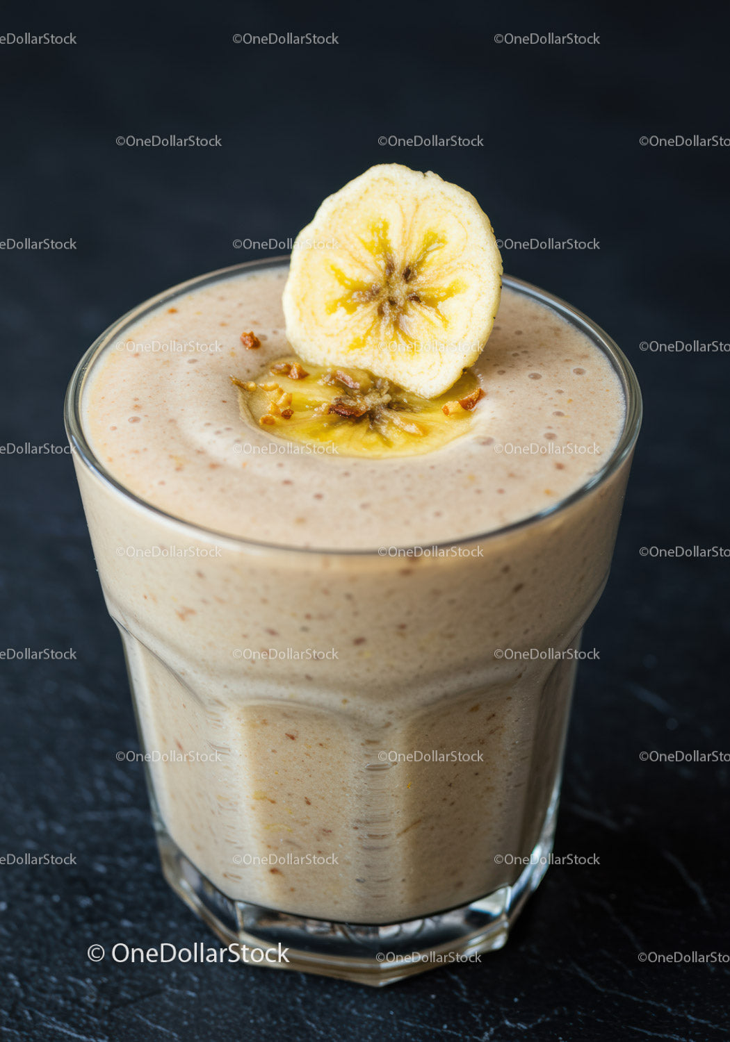 Creamy banana smoothie with dried banana garnish