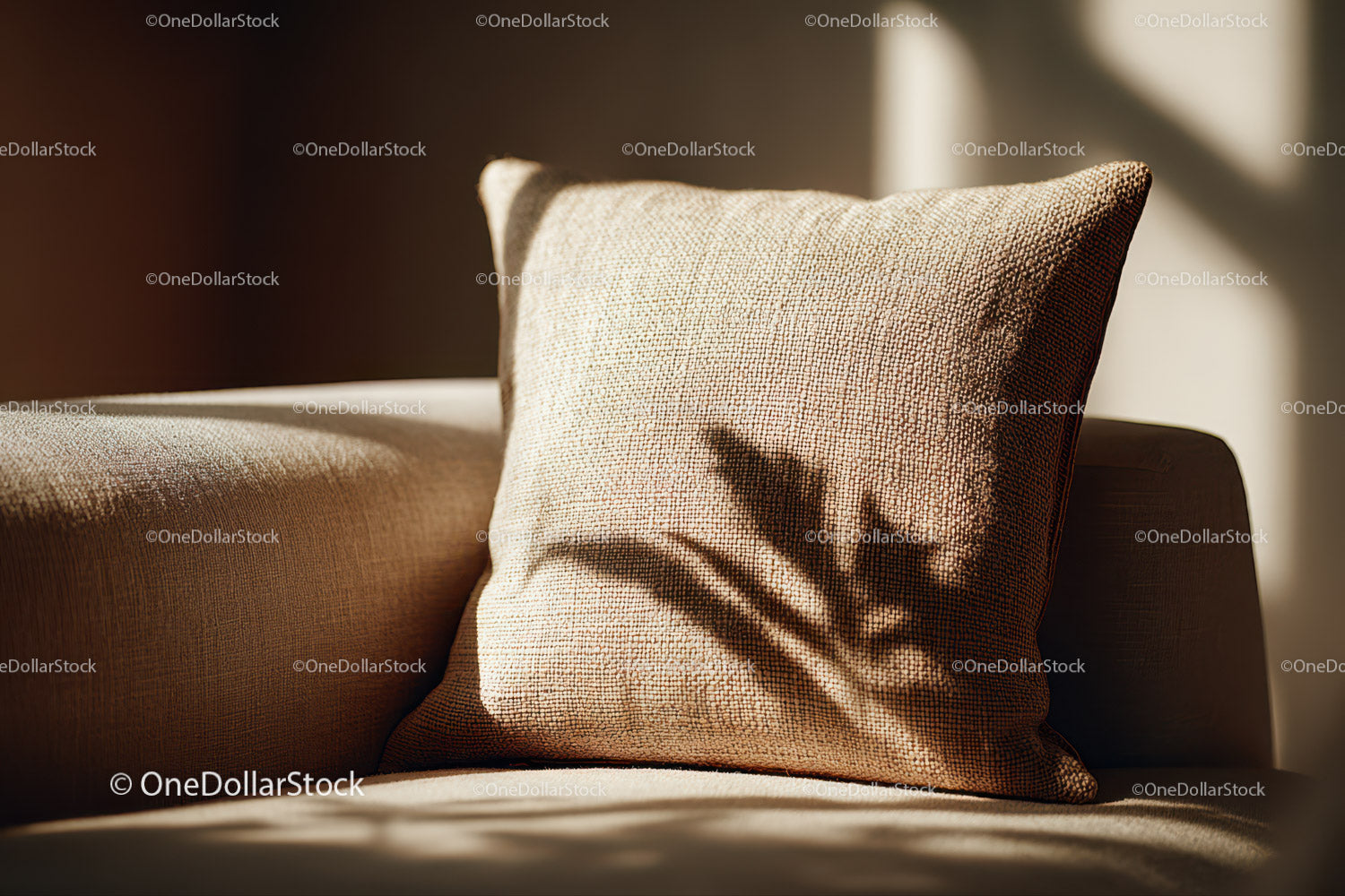 Beige Fabric Cushion on Sofa with Warm Lighting and Textured Detail