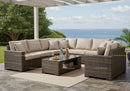 Elegant Outdoor Wicker Sofa Set with Ocean View on Garden Patio