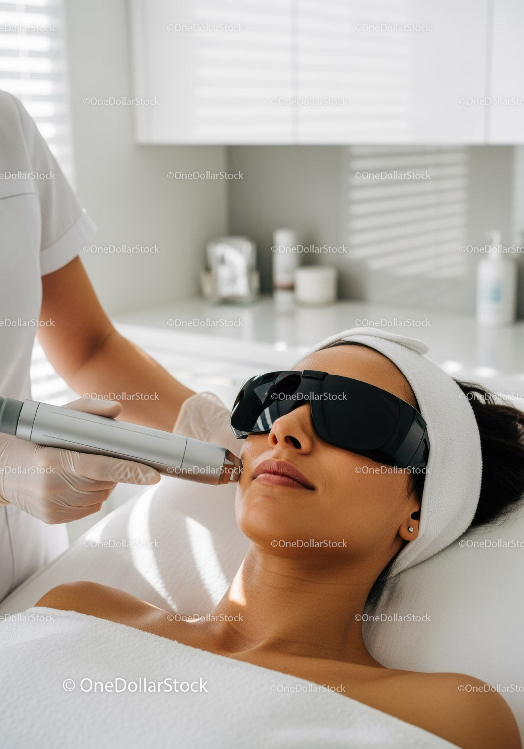 Woman Receiving Laser Skin Rejuvenation Treatment in Modern Clinic