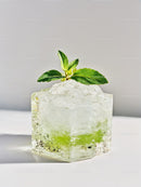 Refreshing mojito cocktail with mint leaves and crushed ice