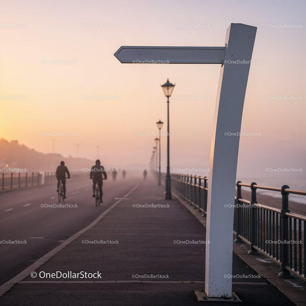 Early Morning Cyclists on Misty Waterfront Path JPG Mockup Image