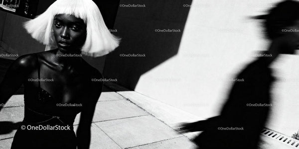 Portrait of a woman with white bob hairstyle in dramatic light