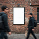 Blank Urban Billboard on Brick Wall with Passing Pedestrians