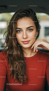 Young woman with wavy hair and captivating blue eyes