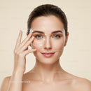 Close-up of a woman receiving facial skincare treatment for glowing skin