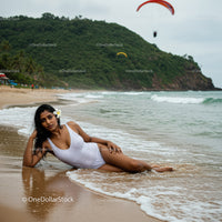 Serene Model at the Beach Embracing Nature's Beauty