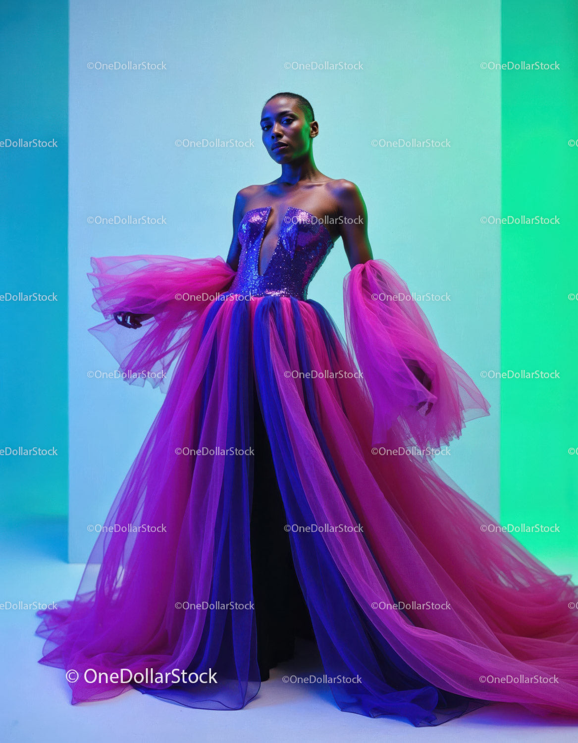 Elegancka modelka w żywej tiulowej sukni z kolorowym wzorem