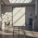 Empty Canvas on Easel in Bright Museum Gallery