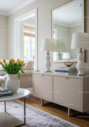 Elegant Living Room with White Sideboard and Yellow Tulips