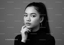 Black and White Portrait of a Woman in Stylish Turtleneck