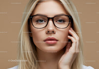 Elegant Blonde Woman in Stylish Glasses Looking Confident