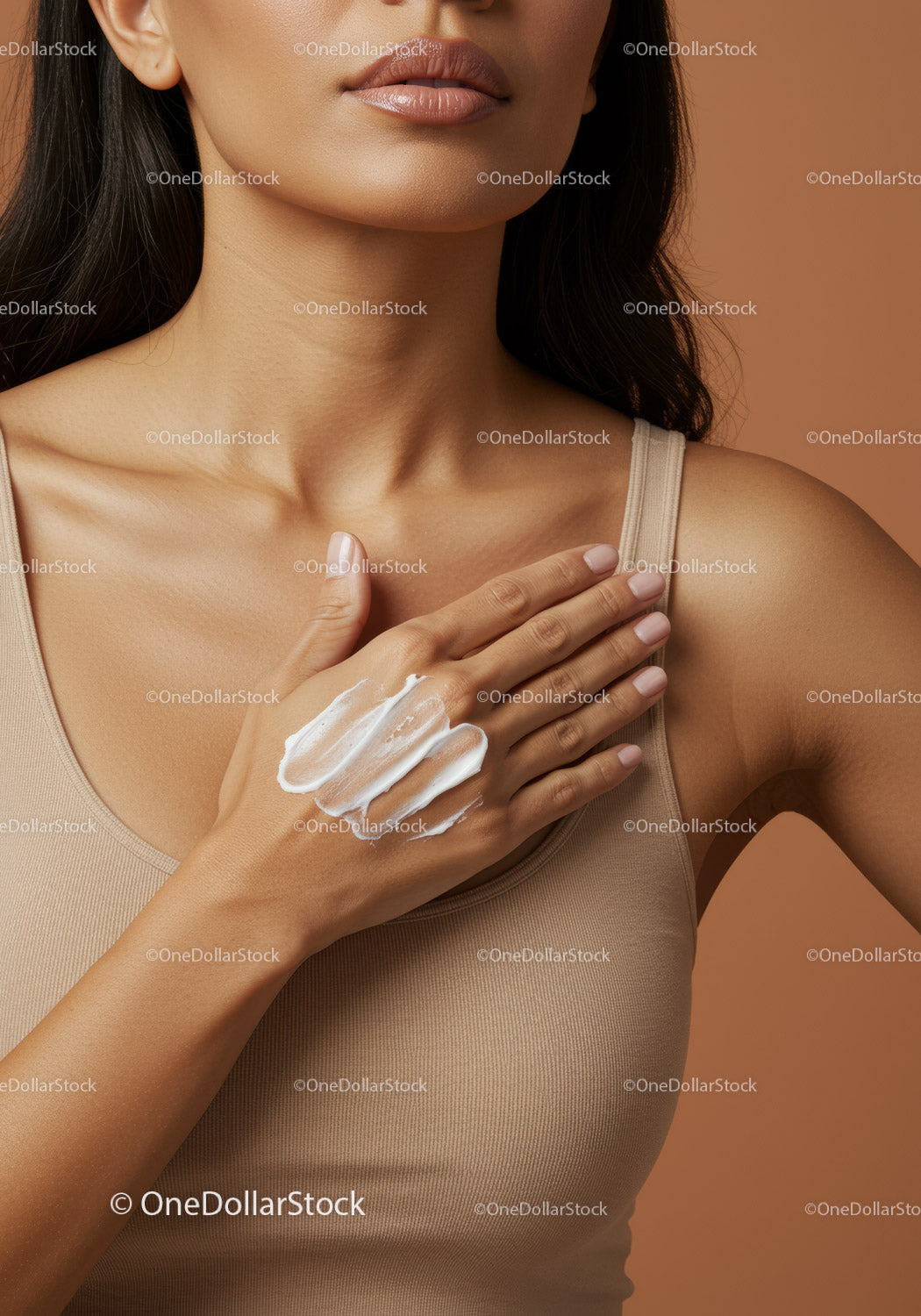 Close-up of Woman Applying Moisturizer on Face Skin