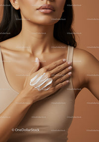 Close-up of Woman Applying Moisturizer on Face Skin