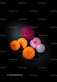 Colorful Slices of Root Vegetables on Dark Background
