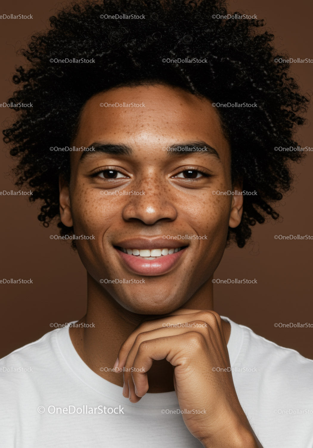 Confident Young Woman with Curly Hair and Bright Smile Portrait
