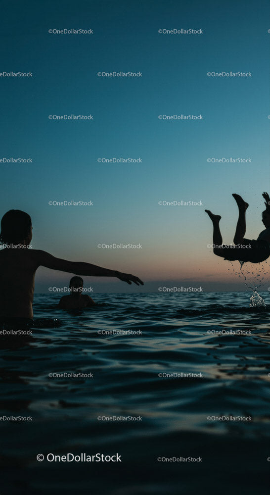 Playful Moments in the Water at Sunset