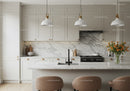 Modern Minimalist Kitchen with Marble Backsplash and Flower Arrangement