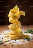 Twisted tagliatelle pasta with flour and herbs
